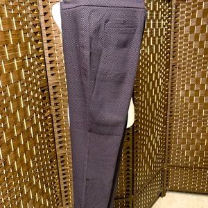 Aloha Bundle- A black and brown specked trousers.